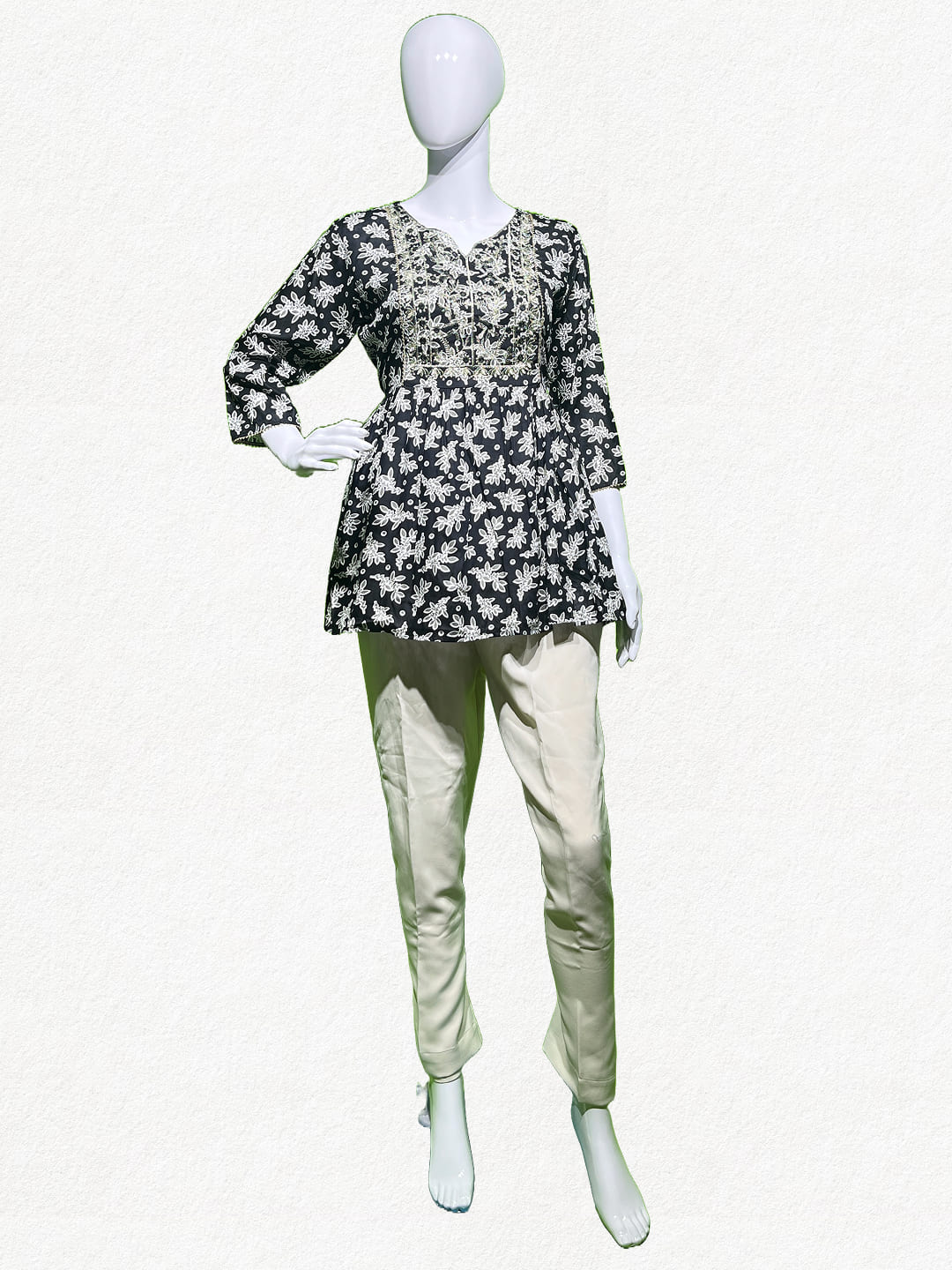 Nocturnal Blossom: Black Floral Embroidered Peplum Tunic