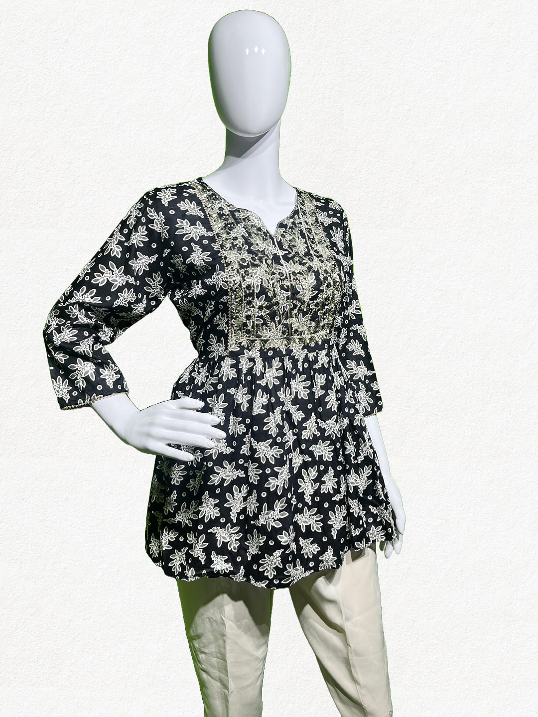 Nocturnal Blossom: Black Floral Embroidered Peplum Tunic